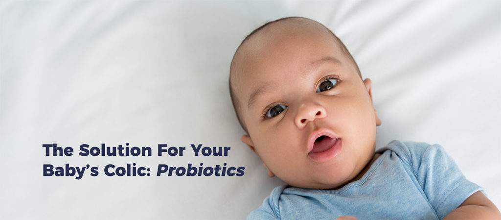Image of infant with text: The Solution For Your Baby’s Colic: Probiotics