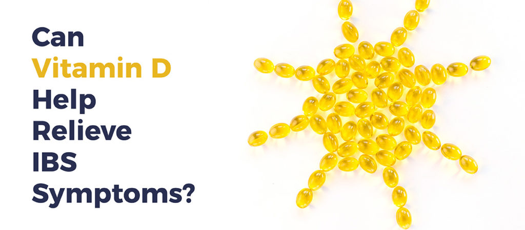 Vitamin D capsules laid out in the shape of the sun. TEXT: Can vitamin D help relieve IBS symptoms?