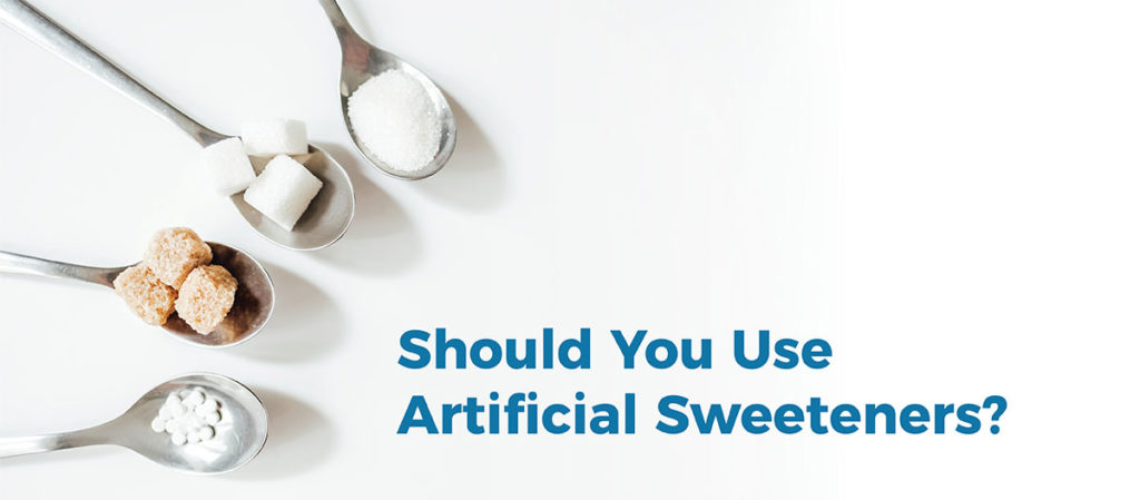 Four spoons holding different types of sugar and artificial sugars. Text: Should you use artificial sweeteners?