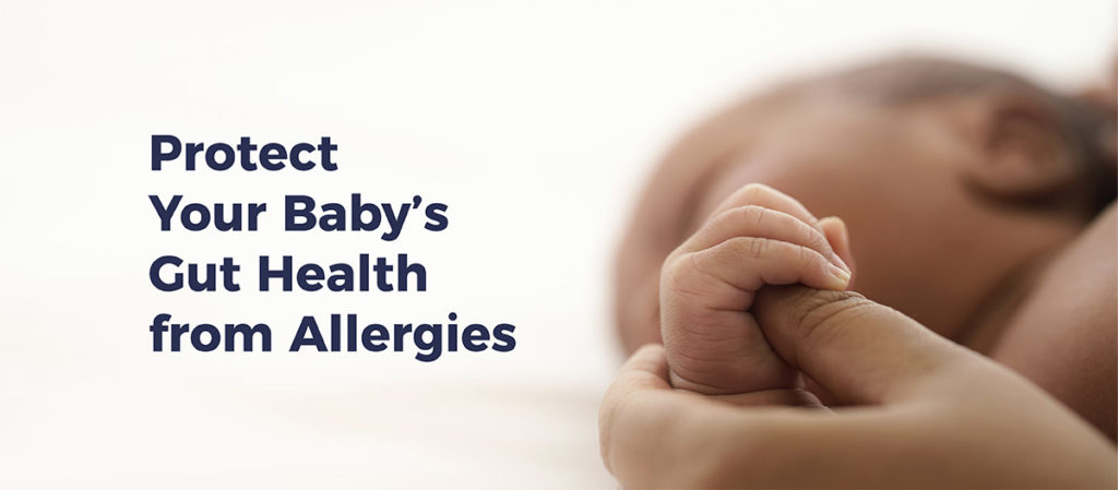 Photograph of infant holding mother's thumb. Text reads "Protect Your Baby's Gut Health from Allergies