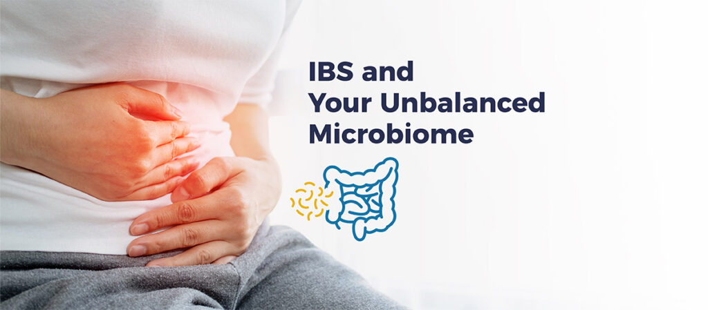 Woman holding their gut. Text reads "IBS and your unbalanced microbiome"
