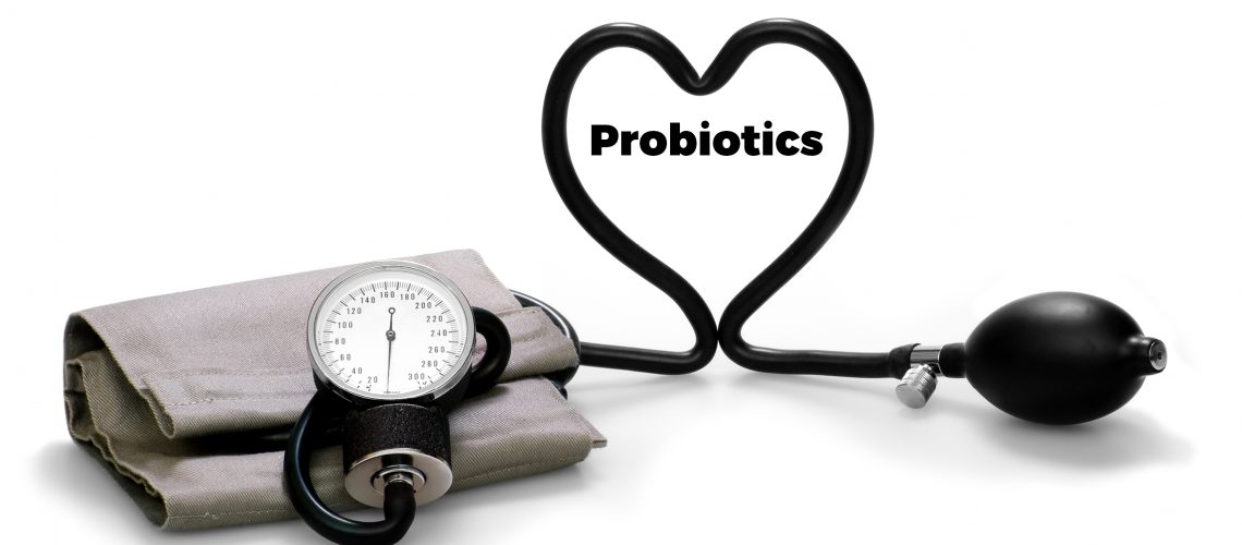 Blood pressure cuff making a heart around "probiotics"