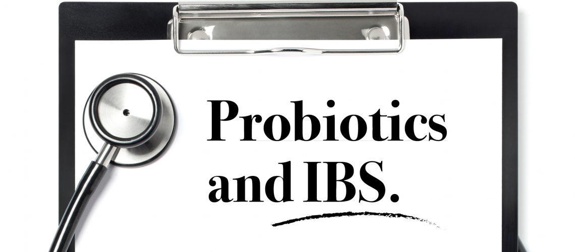 probiotics and IBS written on a paper on a clipboard.